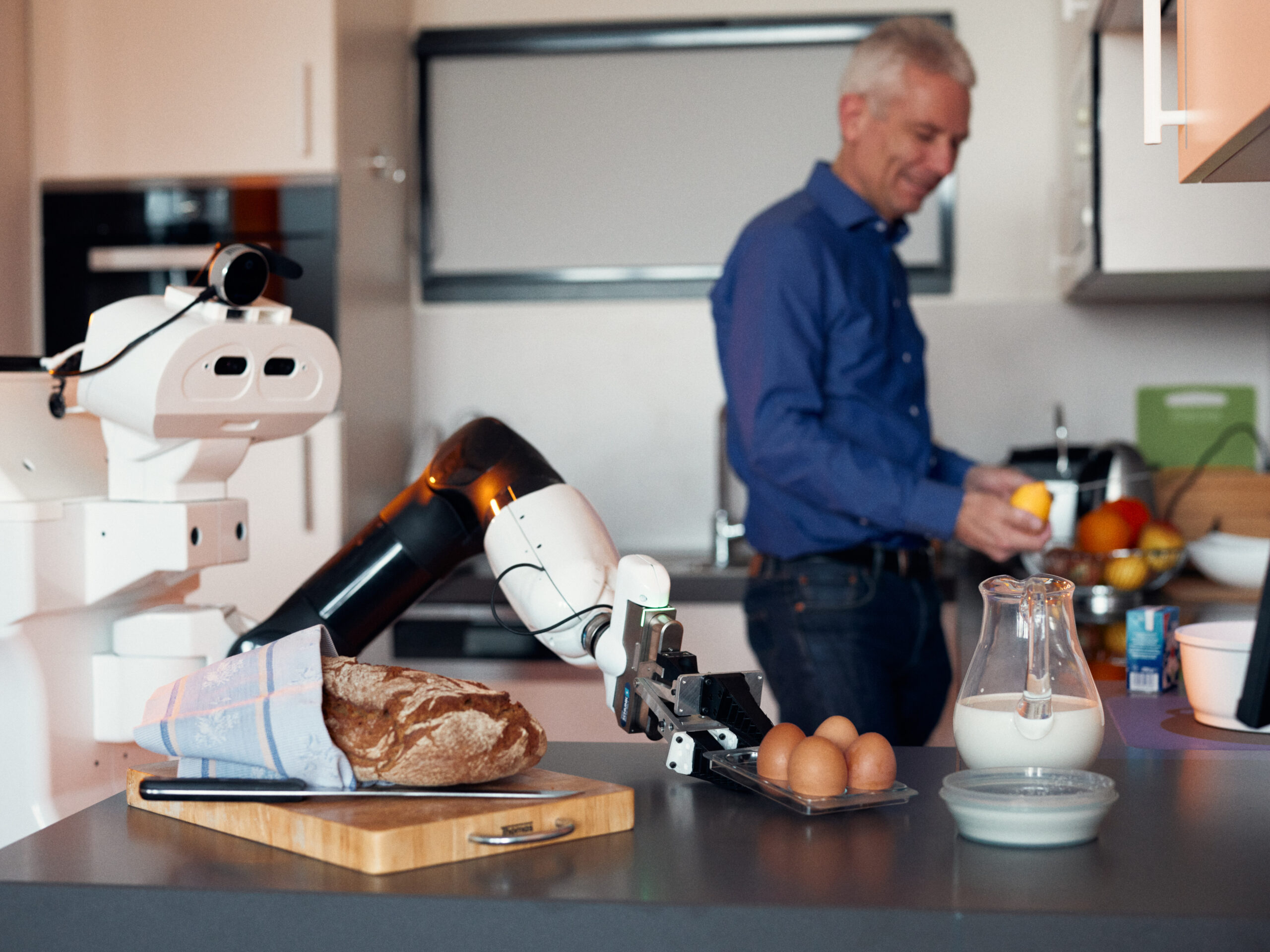 A robot helping with preparing breakfast.
