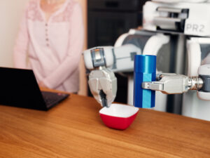 Robot hand holds cup