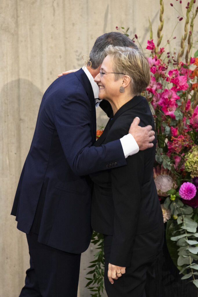 Gerhard Sagerer hugs Angelika Epple.