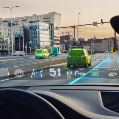Futuristic Autonomous Self-Driving Car Moving Through City, Head